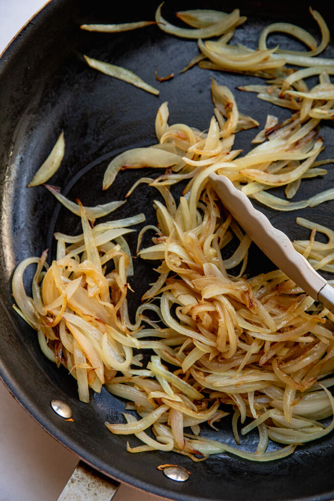Onions after 15 minutes of sauteing in a pan.