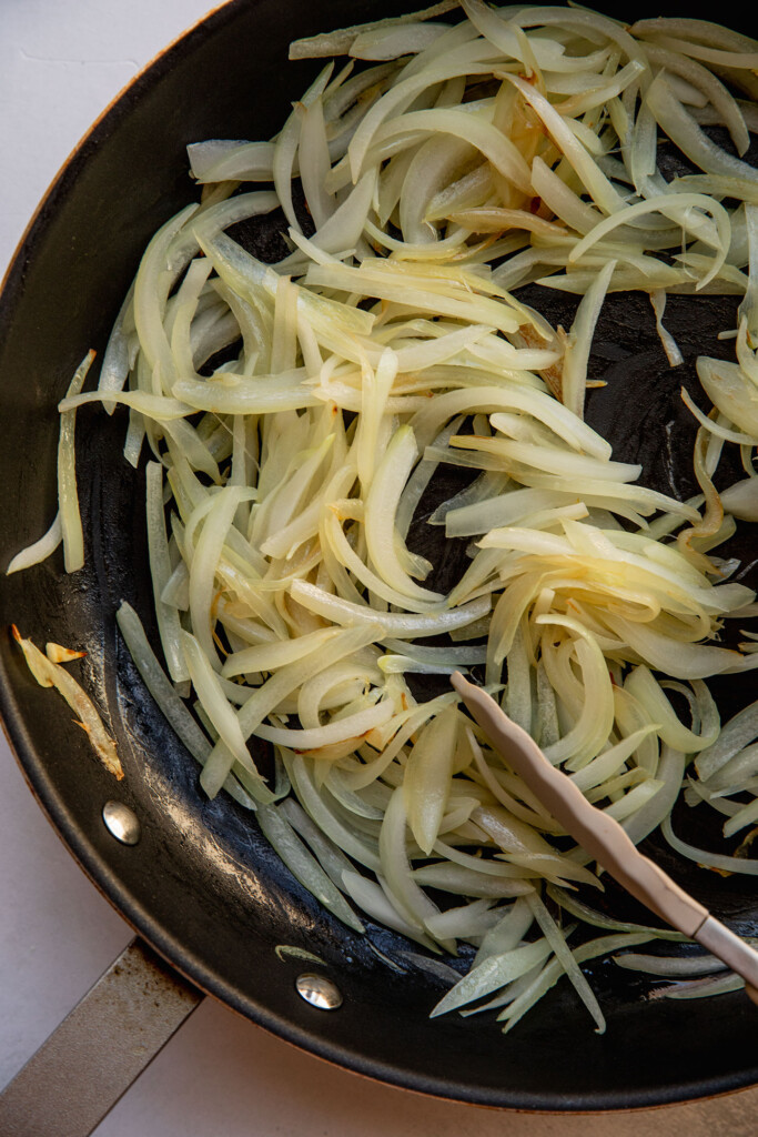 Sauteed onions in a pan after 5 minutes.