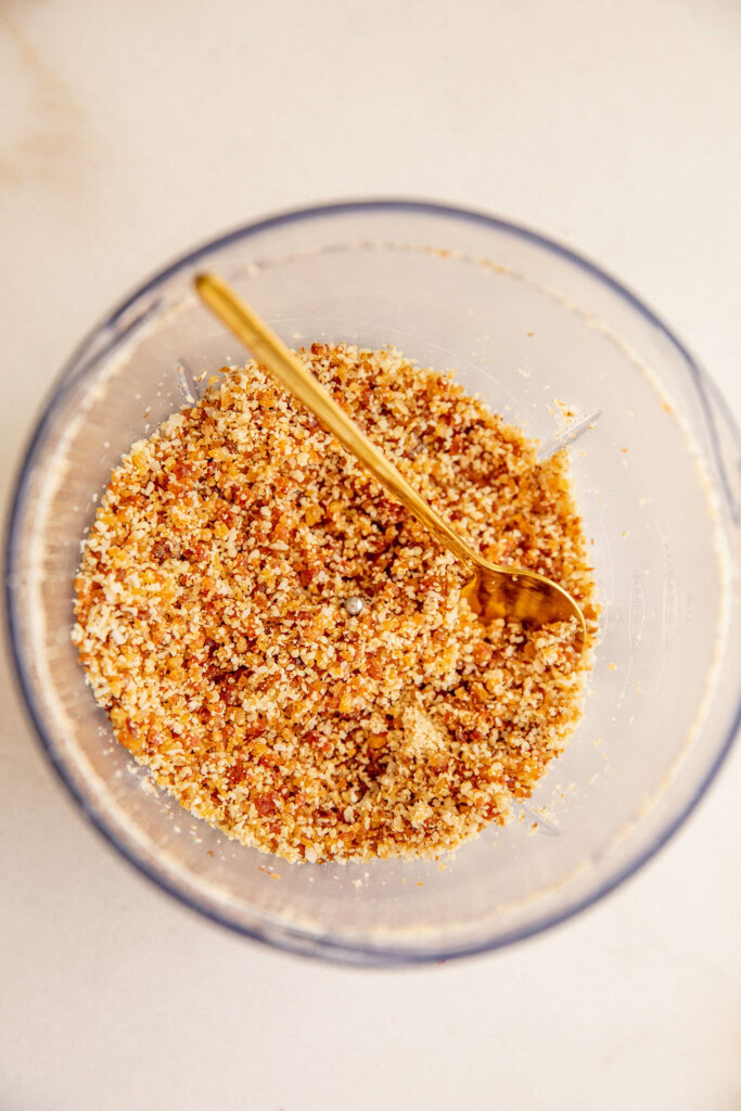 Blended crumble ingredients still in a blender cup.