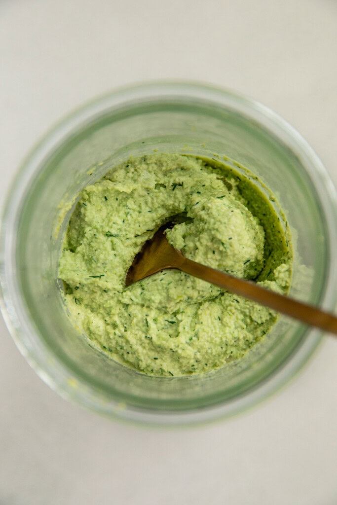 Blended edamame mix in a container.