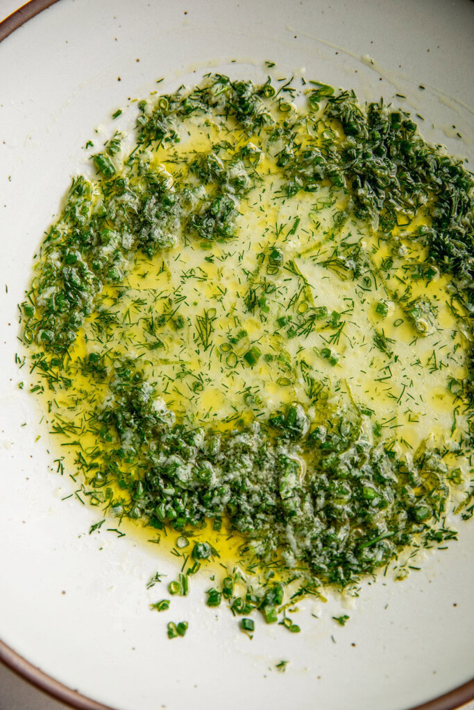 Lime and dill marinade in a bowl.